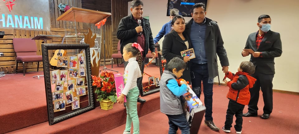 Pastor Sergio Distributing Gifts