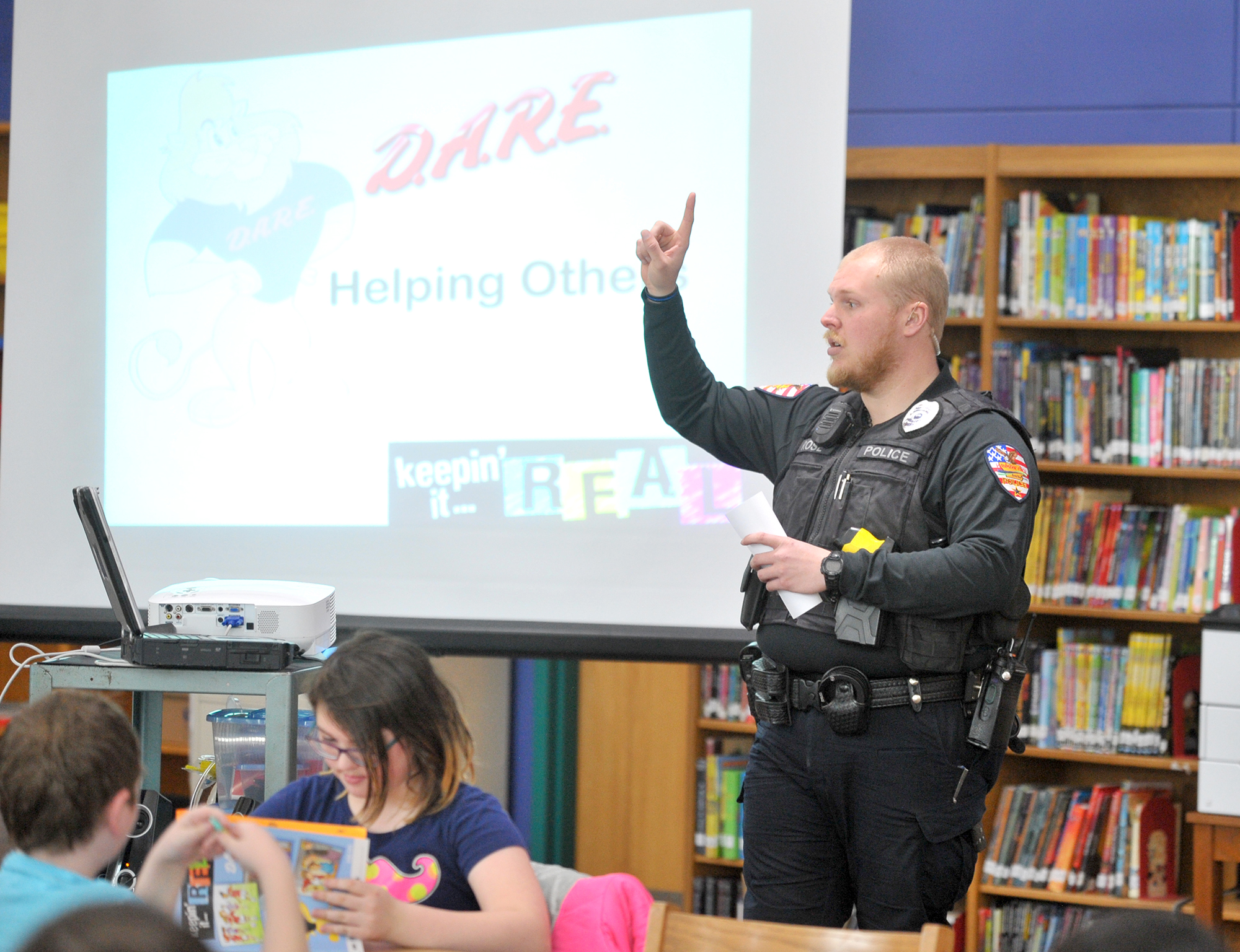 Webster City Police D.A.R.E Officer Dylan Rose talks to one of his groups of fifth-grade students at Webster City Middle School last year. The program has recently returned after a four-year absence.