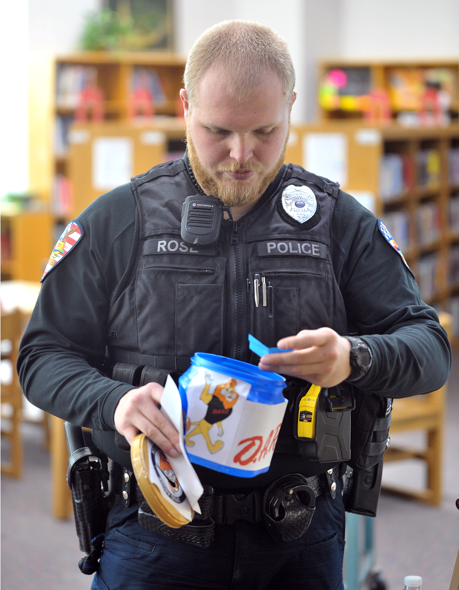 Webster City Police D.A.R.E Officer Dylan Rose checks the question box during a recent class at the Webster City Middle School